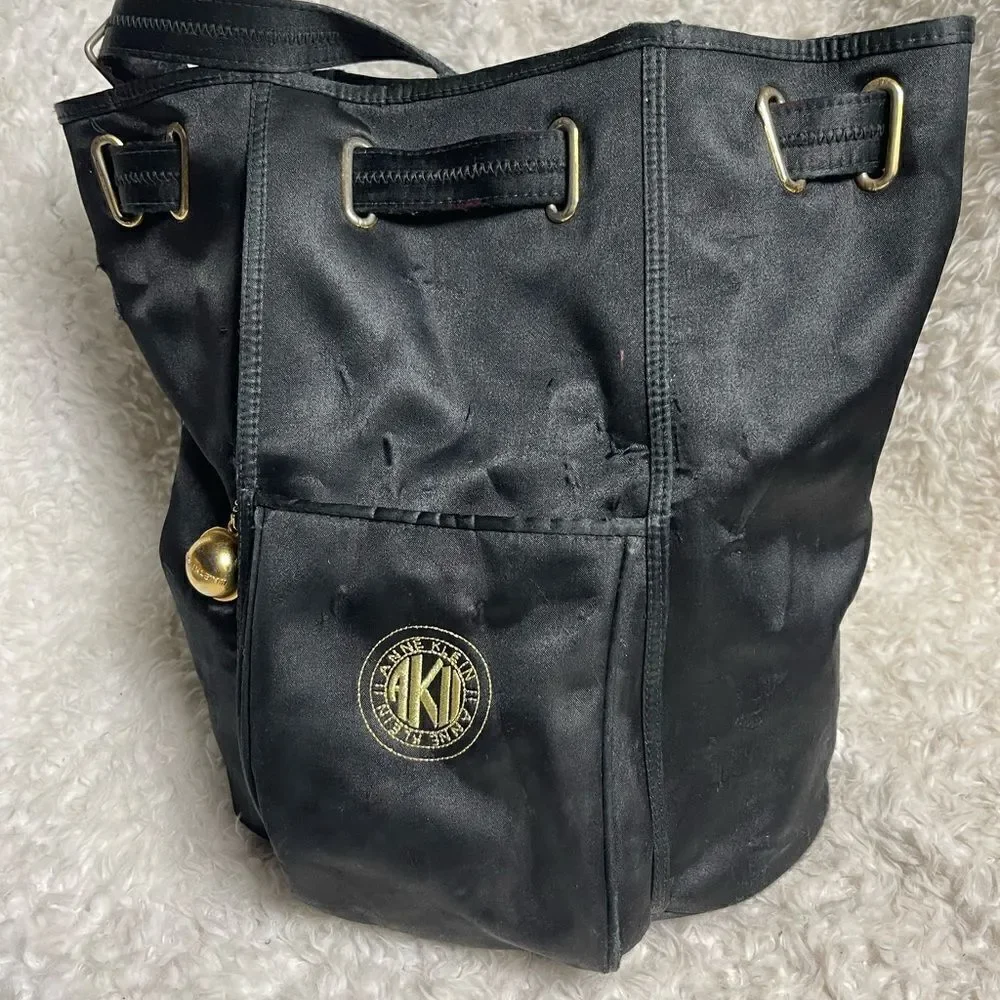 ANN KLEIN II Black Satin medium sling back brass accents .